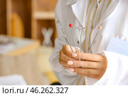 Female speech therapist with logopedic probes in office, closeup. Стоковое фото, фотограф Pixel_shot / Фотобанк Лори