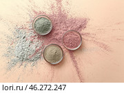 Cosmetic clays in bowls on color background. Стоковое фото, фотограф Pixel_shot / Фотобанк Лори