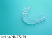 Occlusal splint on color background. Стоковое фото, фотограф Pixel_shot / Фотобанк Лори