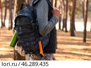 Male tourist with backpack in forest. Стоковое фото, фотограф Pixel_shot / Фотобанк Лори