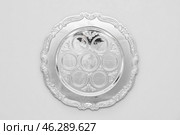 Empty Passover Seder plate on light background. Стоковое фото, фотограф Pixel_shot / Фотобанк Лори