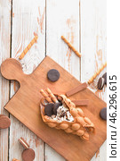 Delicious sweet bubble waffle on table. Стоковое фото, фотограф Pixel_shot / Фотобанк Лори