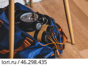 Bag with bomb under chair. Стоковое фото, фотограф Pixel_shot / Фотобанк Лори