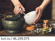 Female alchemist making elixir in laboratory. Стоковое фото, фотограф Pixel_shot / Фотобанк Лори