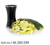 Fresh zucchini spaghetti with spiral grater isolated on white. Стоковое фото, фотограф Pixel_shot / Фотобанк Лори