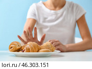 Young woman refusing from food. Anorexia concept. Стоковое фото, фотограф Pixel_shot / Фотобанк Лори