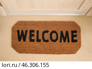 Doormat with word WELCOME in hall, top view. Стоковое фото, фотограф Pixel_shot / Фотобанк Лори