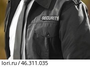 Male security guard outdoors, closeup. Стоковое фото, фотограф Pixel_shot / Фотобанк Лори