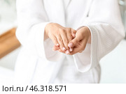 Young woman with beautiful manicure in bathroom, closeup. Стоковое фото, фотограф Pixel_shot / Фотобанк Лори