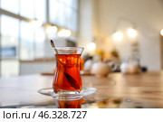 Cup of hot Turkish tea on table. Стоковое фото, фотограф Pixel_shot / Фотобанк Лори