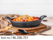 Dish with tasty pasta and beans on table. Стоковое фото, фотограф Pixel_shot / Фотобанк Лори