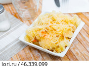 Homemade pickled cabbage on white plate closeup, natural probiotic. Стоковое фото, фотограф Яков Филимонов / Фотобанк Лори