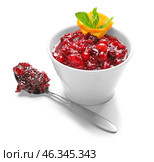 Bowl with tasty cranberry sauce, orange and mint on white background. Стоковое фото, фотограф Pixel_shot / Фотобанк Лори