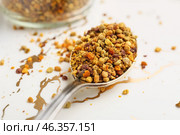 Spoon with bee pollen on white background, closeup. Стоковое фото, фотограф Pixel_shot / Фотобанк Лори
