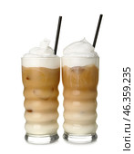Glasses of iced hojicha latte on white background. Стоковое фото, фотограф Pixel_shot / Фотобанк Лори