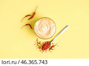 Bowl of tasty chipotle sauce on yellow background. Стоковое фото, фотограф Pixel_shot / Фотобанк Лори