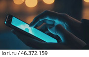 Point finger on screen phone closeup, person testing test message, touch blue screen on smartphone. Night Bokeh Light. Close-UP. Person using in hands mobile phone close up in the dark. Online wi-fi. Стоковое AI-видео, аниматор Марина Демидюк / Фотобанк Лори