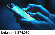 Point finger on screen phone closeup, person testing test message, touch blue screen on smartphone. Night Bokeh Light. Close-UP. Person using in hands mobile phone close up in the dark. Online wi-fi. Стоковое AI-видео, аниматор Марина Демидюк / Фотобанк Лори