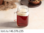 Mason jar of fresh kvass on white background. Стоковое фото, фотограф Pixel_shot / Фотобанк Лори