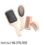 Hair brushes and combs on white background. Стоковое фото, фотограф Pixel_shot / Фотобанк Лори