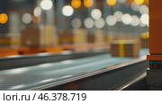 Cardboard boxes speeding on a conveyor belt in a bustling warehouse. Packages Move on a Conveyor Belt. Logistics and transportation background. Product distribution center. Moving image. Export, cargo. Стоковое AI-видео, аниматор Марина Демидюк / Фотобанк Лори