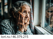 Minimalism. Portrait of an old elderly woman, a pensioner, a concept of the life of the elderly, health, loneliness and memory loss. Стоковое AI-изображение, AI-художник Photojuli / Фотобанк Лори