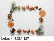Beautiful composition with fir branches and snow on white background. Winter time. Стоковое фото, фотограф Pixel_shot / Фотобанк Лори