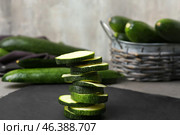 Slices of zucchini squashes on table. Стоковое фото, фотограф Pixel_shot / Фотобанк Лори