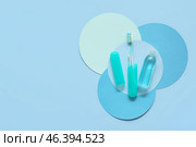 Toothbrush, case and mouth rinse on color background. Стоковое фото, фотограф Pixel_shot / Фотобанк Лори