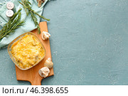 Baking dish with tasty julienne and ingredients on color background. Стоковое фото, фотограф Pixel_shot / Фотобанк Лори