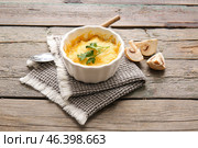 Ramekin with tasty julienne on wooden background. Стоковое фото, фотограф Pixel_shot / Фотобанк Лори