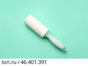 Lint roller on color background. Стоковое фото, фотограф Pixel_shot / Фотобанк Лори