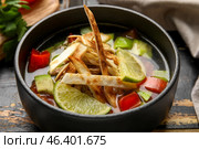 Bowl of tasty Sopa de Lima soup on table, closeup. Стоковое фото, фотограф Pixel_shot / Фотобанк Лори
