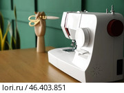 Modern sewing machine on table, closeup. Стоковое фото, фотограф Pixel_shot / Фотобанк Лори