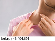Young man with mole on grey background, closeup. Стоковое фото, фотограф Pixel_shot / Фотобанк Лори