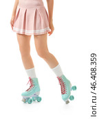 Beautiful young woman on roller skates against white background. Стоковое фото, фотограф Pixel_shot / Фотобанк Лори
