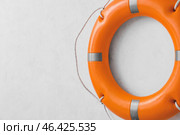 Lifebuoy ring on light background. Стоковое фото, фотограф Pixel_shot / Фотобанк Лори