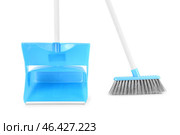 Cleaning broom with dustpan isolated on white background. Стоковое фото, фотограф Pixel_shot / Фотобанк Лори