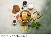 Bowl of tasty Hodgepodge soup with sour cream and bread on grunge background. Стоковое фото, фотограф Pixel_shot / Фотобанк Лори