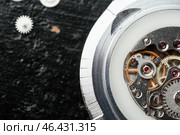 Disassembled watch on dark background, closeup. Стоковое фото, фотограф Pixel_shot / Фотобанк Лори