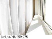 Световые завесы возле окна в комнате. Стоковое фото, фотограф Pixel_shot / Фотобанк Лори