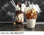 Различные вкусные шалости на темном фоне. Стоковое фото, фотограф Pixel_shot / Фотобанк Лори