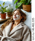 Spa treatments for the face, peeling face mask, skin care. Young woman with cream mask on her face. Close-up. Стоковое AI-изображение, AI-художник Сергей Елизарьев / Фотобанк Лори