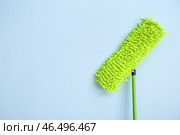 Швабра на цветном фоне. Стоковое фото, фотограф Pixel_shot / Фотобанк Лори