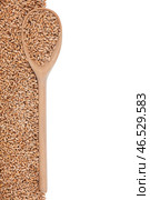 Wheat with a wooden spoon. Стоковое фото, фотограф Александр Собко / Фотобанк Лори
