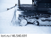 Snowmobile. Snowmobile in the forest on a winter highway. Snowmobile operation. Стоковое фото, фотограф Александр Поташев / Фотобанк Лори