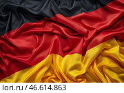 Флаг Германии как символ национальной гордости и поддержки сборной на международных спортивных соревнованиях. Редакционное AI-изображение, AI-художник Anna Leeva / Фотобанк Лори
