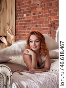 Elegance and Charm Captured in a Cozy Indoor Setting With a Whimsical Touch. Стоковое фото, фотограф Aleksandr Golubev / Фотобанк Лори