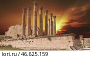 Temple of Zeus, Jordanian city of Jerash (Gerasa of Antiquity), capital and largest city of Jerash Governorate, Jordan. Against the background of the sunset. 4K, time lapse, with zoom. Стоковое видео, видеограф Владимир Журавлев / Фотобанк Лори