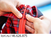 Молния на одежде. Стоковое фото, фотограф Артем Геодакян / ТАСС / Фотобанк Лори